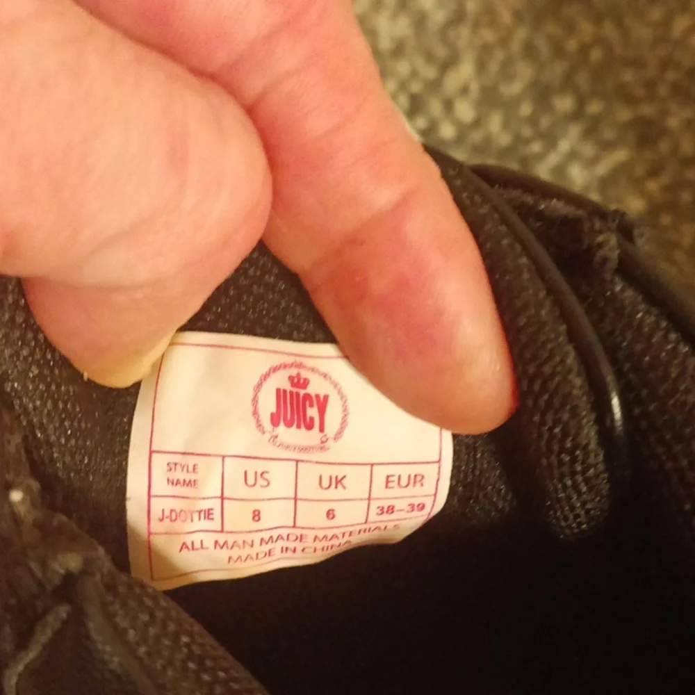 Juicy Couture black high top sneakers size 8 rose hold hardware